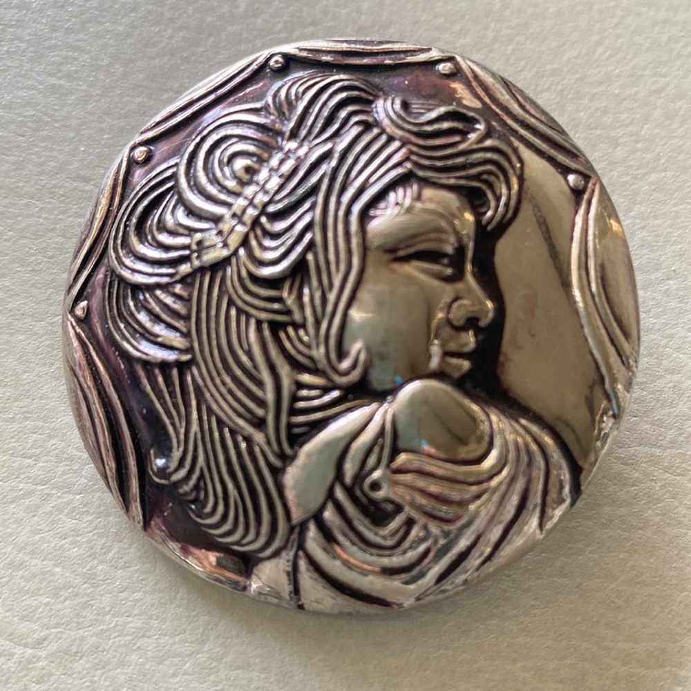 Vintage woman’s Profile face brooch